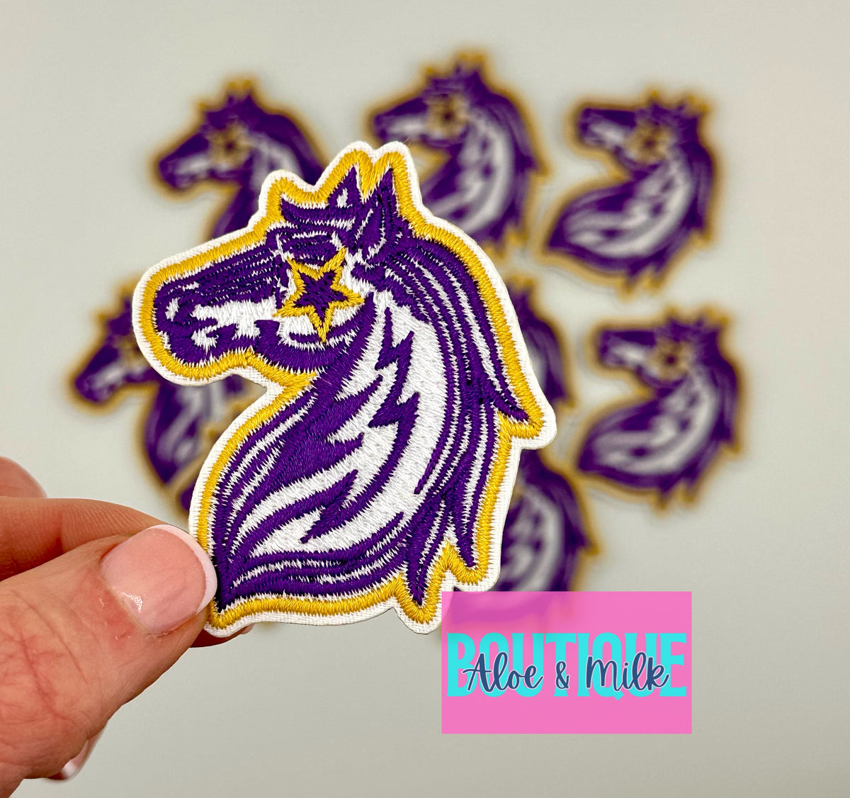Mascot Mustang, team patches