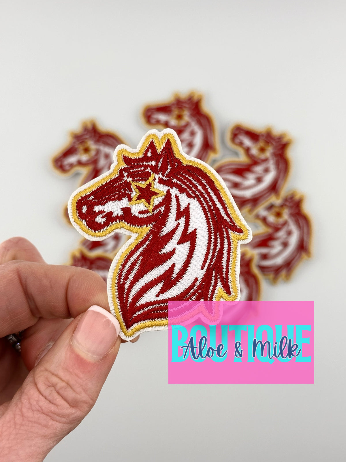 Mascot Mustang, team patches